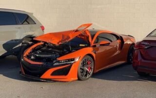 acura-nsx-runs-face-first-into-a-jeep-wrangler-at-a-dealership
